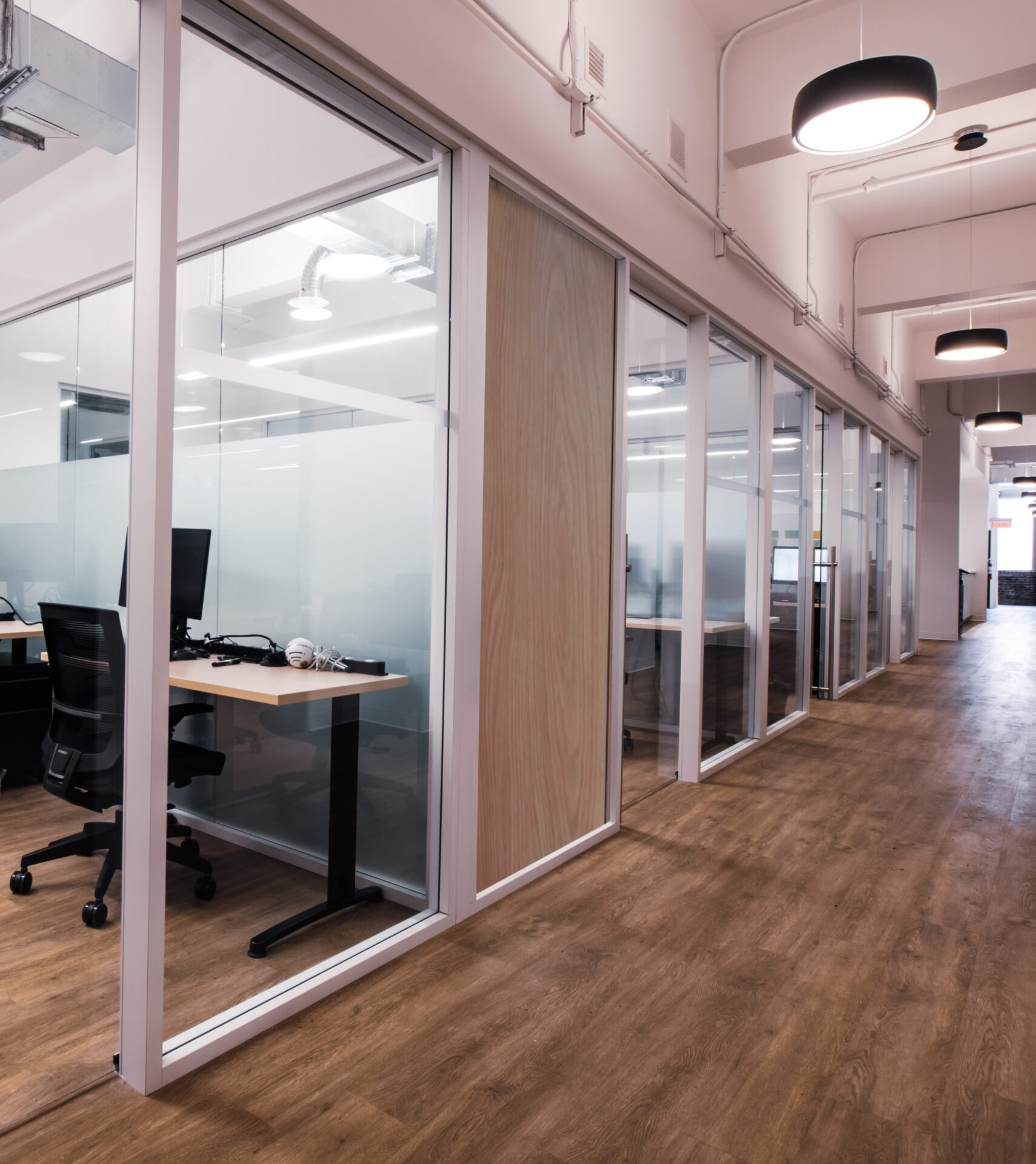 Starwall's versatility in action: 
Wood veneer panel integrated in place of glass